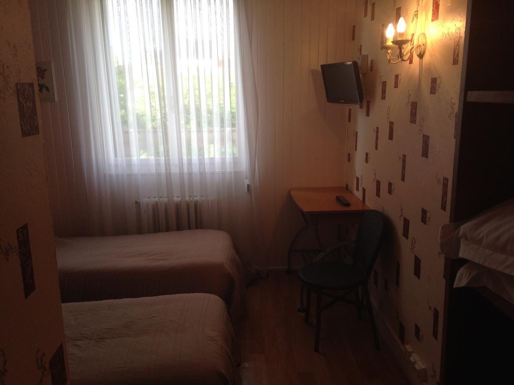 Arcantis Hotel La Residence Cergy Habitación foto